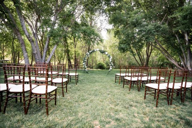 Garden ceremony seating among the trees